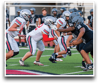 Three football players are standing on the field, one of them is smiling and wearing a black jersey with the number 55. AI generated content