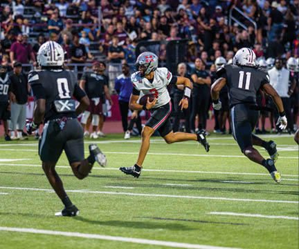 Three football players are standing on the field, one of them is smiling and wearing a black jersey with the number 55. AI generated content