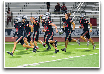 Three football players are standing on the field, one of them is smiling and wearing a black jersey with the number 55. AI generated content