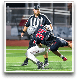 Three football players are standing on the field, one of them is smiling and wearing a black jersey with the number 55. AI generated content