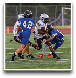 Three football players are standing on the field, one of them is smiling and wearing a black jersey with the number 55. AI generated content