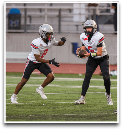 Three football players are standing on the field, one of them is smiling and wearing a black jersey with the number 55. AI generated content