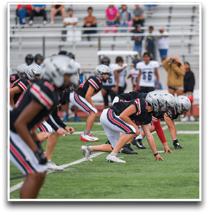 Three football players are standing on the field, one of them is smiling and wearing a black jersey with the number 55. AI generated content