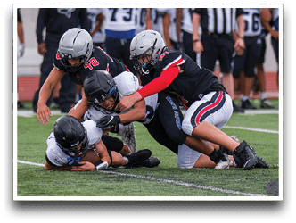 Three football players are standing on the field, one of them is smiling and wearing a black jersey with the number 55. AI generated content
