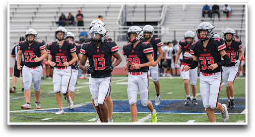 Three football players are standing on the field, one of them is smiling and wearing a black jersey with the number 55. AI generated content