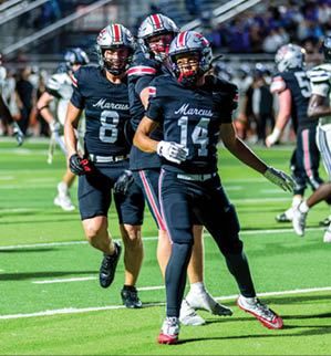 Three football players are standing on the field, one of them is smiling and wearing a black jersey with the number 55. AI generated content