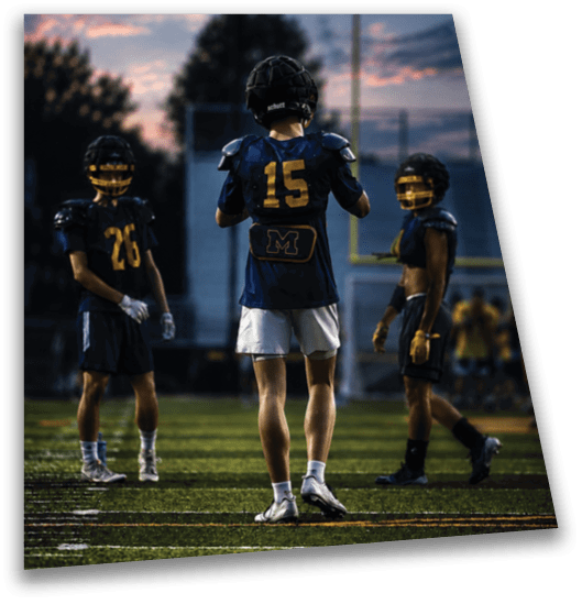 Three football players in blue uniforms are standing on a field. One player is wearing a number 15 jersey. AI generated content