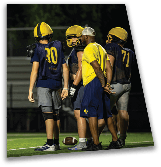 A group of football players standing on the field. AI generated content