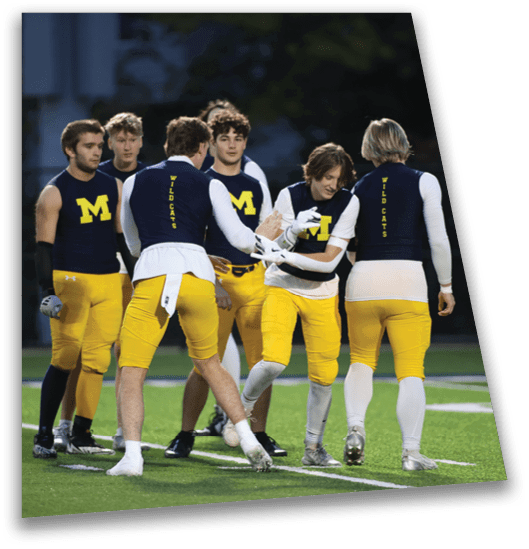 A group of football players wearing yellow and blue uniforms huddle together on the field. AI generated content
