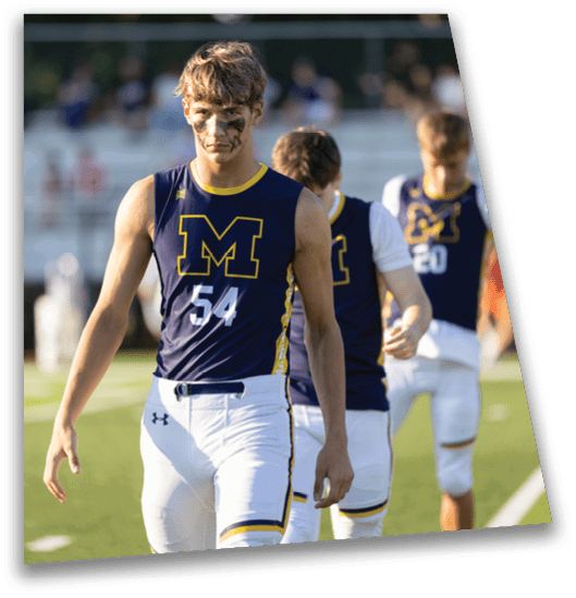 Three men wearing blue and white jerseys are walking on a field. AI generated content