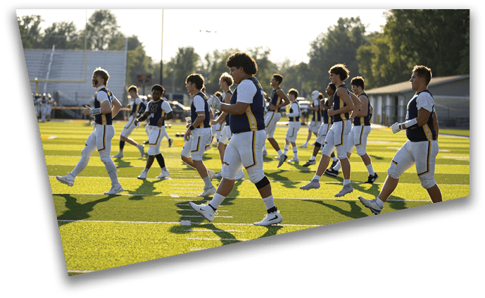 A group of young men wearing uniforms are walking on a field. AI generated content