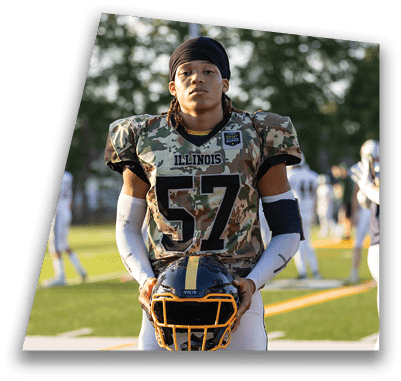A football player wearing a camouflage jersey stands on a field. AI generated content