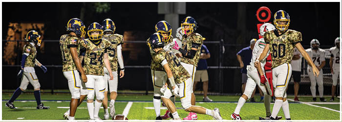 A group of football players are standing on a field. AI generated content