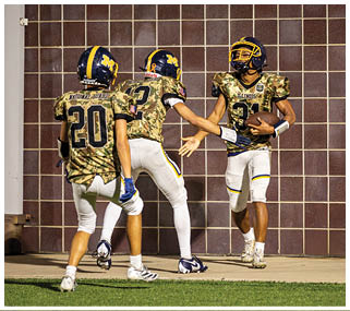 Three football players are shaking hands with each other. AI generated content