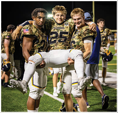 Three football players are standing on the field, posing for a picture. AI generated content