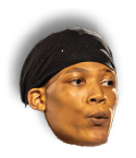 Person wearing a black headscarf with a focused expression looking slightly to the side. Description generated by AI