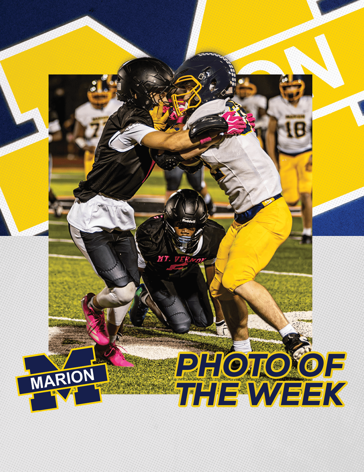 Two people in football gear are engaged in a close physical play on a field while a third person kneels nearby, with others standing in the background. Description generated by AI