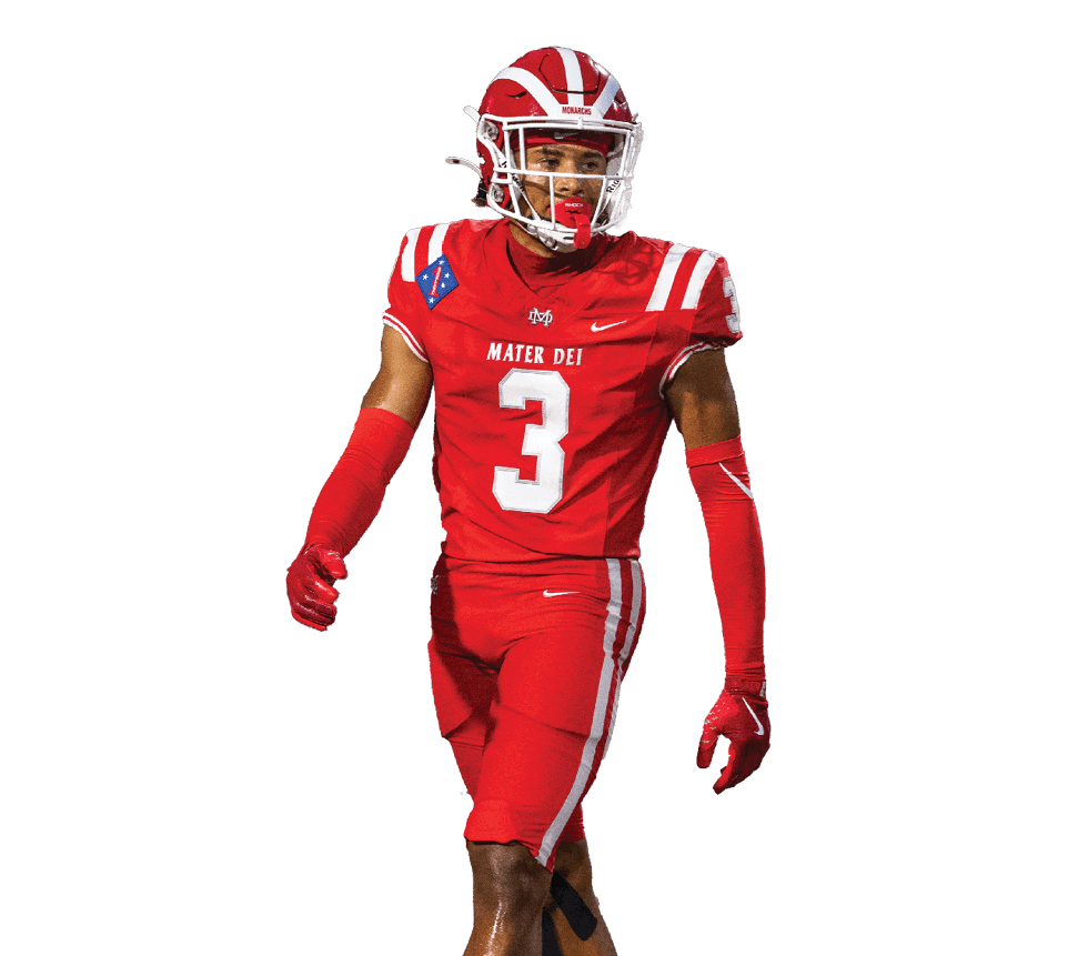 A person wearing a red football uniform with the number three is walking on a white background. Description generated by AI