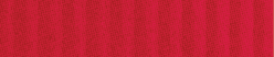 A close-up view of a red textured fabric with a subtle grid pattern. Description generated by AI