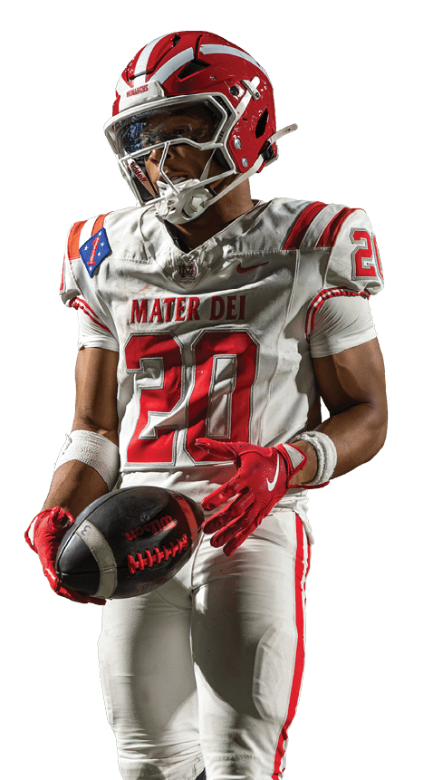 A person wearing a red and white football uniform with the number 20 on the shoulder and red gloves is holding a football. Description generated by AI
