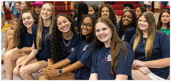 A football player is sliding on the ground. Description generated by AI
