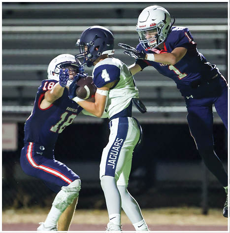 A football player running on the field. Description generated by AI