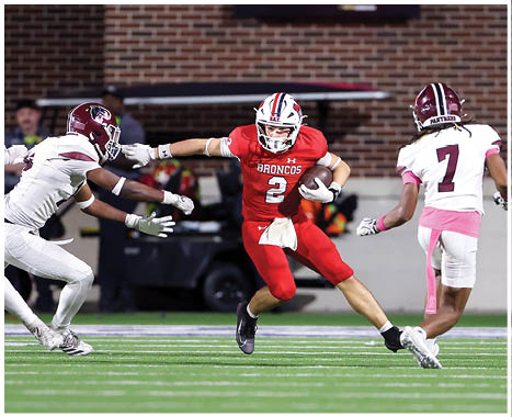 A football player running on the field. Description generated by AI