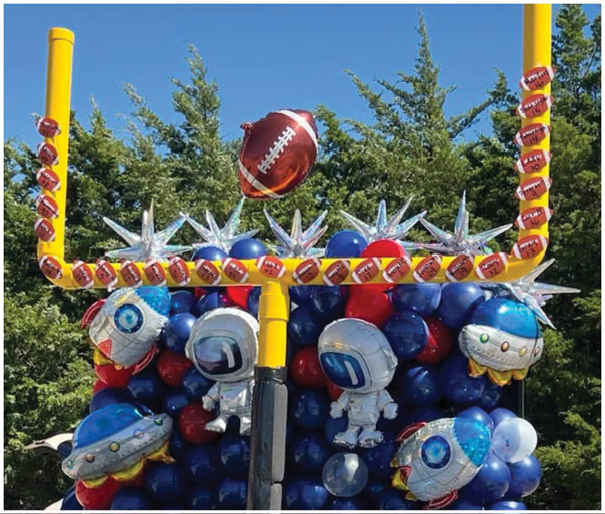 A group of football players on a field. Description generated by AI