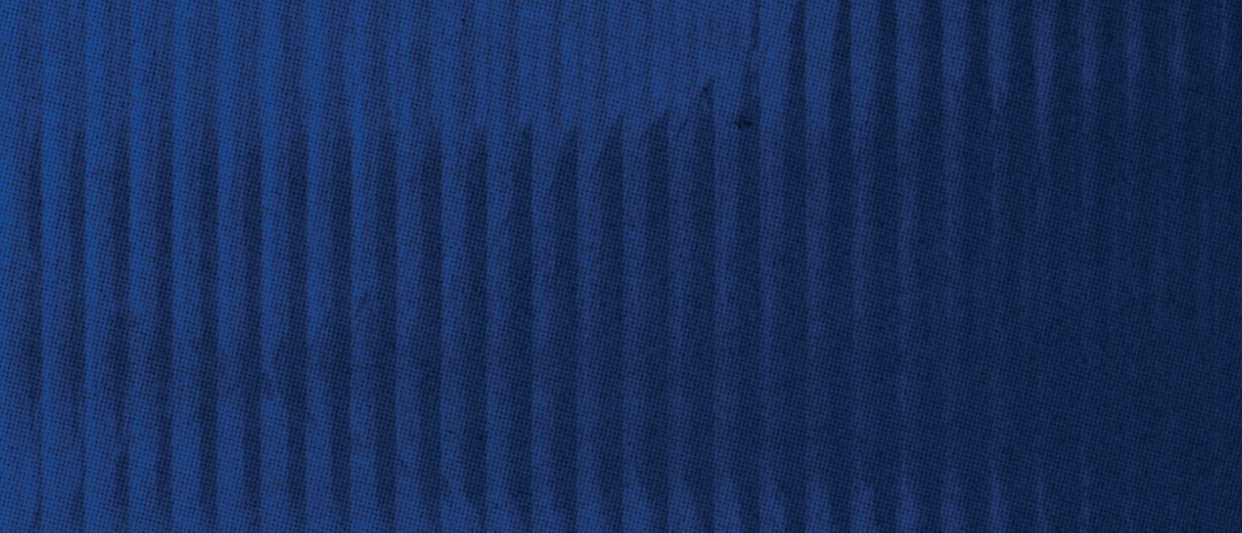 A blue sky with no clouds. Description generated by AI