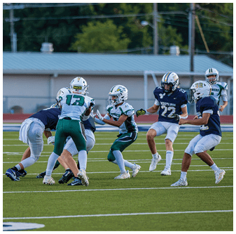 A football player is sliding on the ground. Description generated by AI