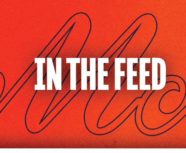 A blue and orange blanket with the words “In the feed" written on it. Description generated by AI