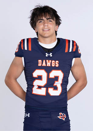A young man wearing a white and black jersey with the number 14 on it. Description generated by AI