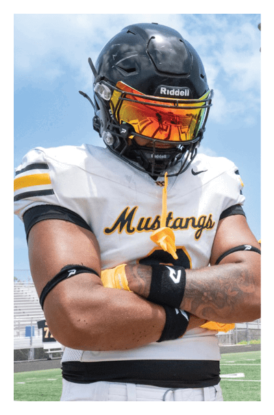 A young man wearing a football jersey with the name Vista on the back. AI generated content