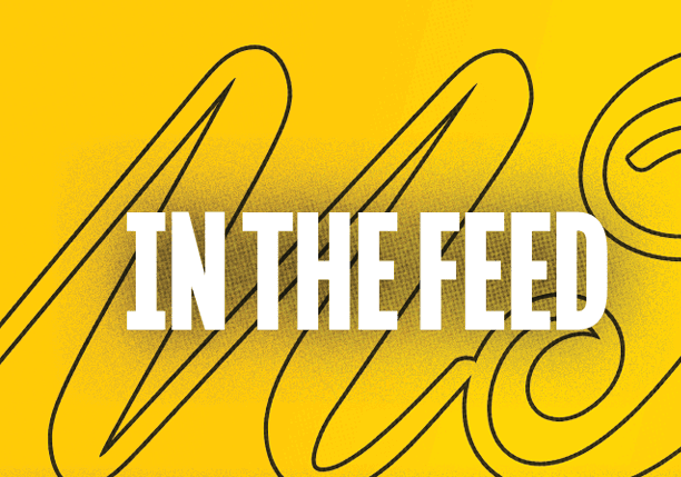 A black and yellow sign with the word feed on it. Description generated by AI
