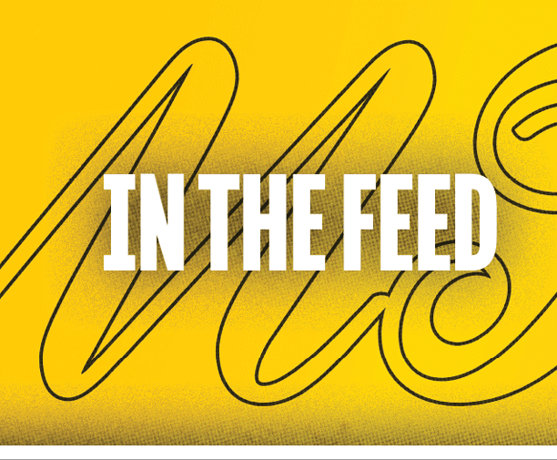 A black and yellow sign with the word feed on it. Description generated by AI