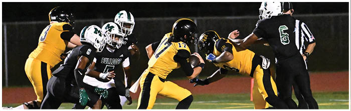 A football player is sliding on the ground. Description generated by AI
