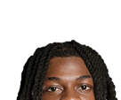 Person with long twisted hair looking directly at the camera against a white background. Description generated by AI