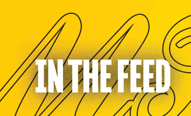A black and yellow sign with the word feed on it. Description generated by AI