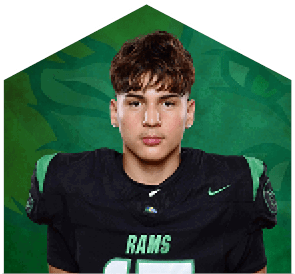 A young man wearing a white jersey with the number 10 on it. Description generated by AI