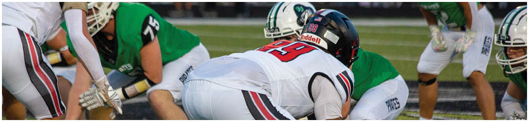 A football player in a white jersey with the number 22 on it. Description generated by AI
