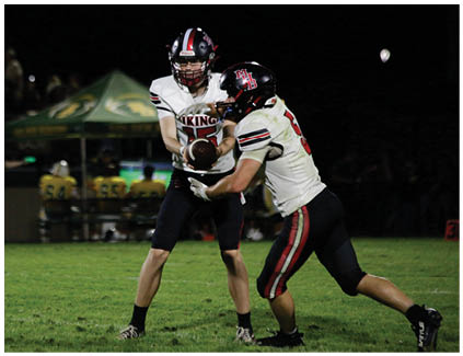 A football game is being played with two teams on the field. Description generated by AI