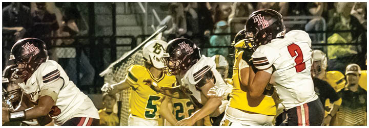 A football game is being played with two teams. Description generated by AI