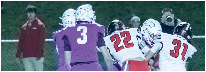 A football game is being played with two teams on the field. Description generated by AI