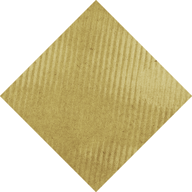 A close-up of a textured, triangular piece of brown corrugated cardboard with a solid mustard yellow shape partially visible at the bottom. Description generated by AI