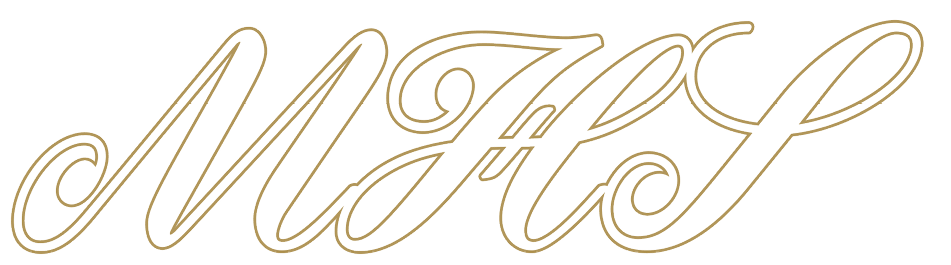 Elegant gold cursive letters spelling “MHS" on a white background. Description generated by AI