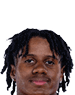 A young man wearing a white jersey with the number 10 on it. Description generated by AI