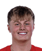 A young man wearing a white jersey with the number 10 on it. Description generated by AI