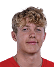 A young man wearing a white jersey with the number 10 on it. Description generated by AI