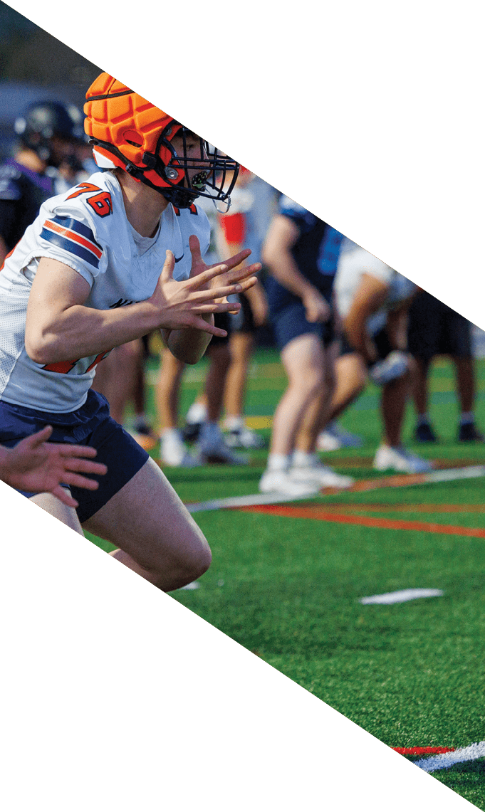 A group of football players pose for a picture. AI generated content