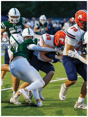 A football player wearing a blue jersey with the number 58 on it. Description generated by AI